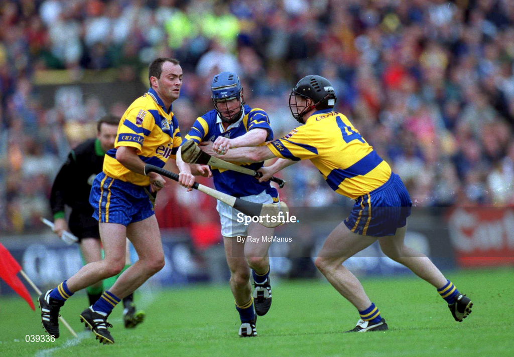 11 June 2000; Paddy O'Brien of Tipperary in action against Anthony Daly, left, and Frank Lohan and Clare during the Guinness Munster Senior Hurling Championship Semi-Final match between Tipperary and Clare at Páirc Uí Chaoimh in Cork. Photo by Ray McManus/Sportsfile