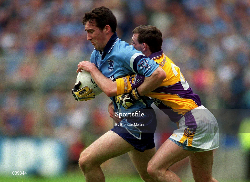 11 June 2000; Paddy Christie of Dublin in action against Colm Morris of Wexford during the Bank of Ireland Leinster Senior Football Championship Quarter-Final match between Dublin and Wexford at Croke Park in Dublin. Photo by Brendan Moran/Sportsfile