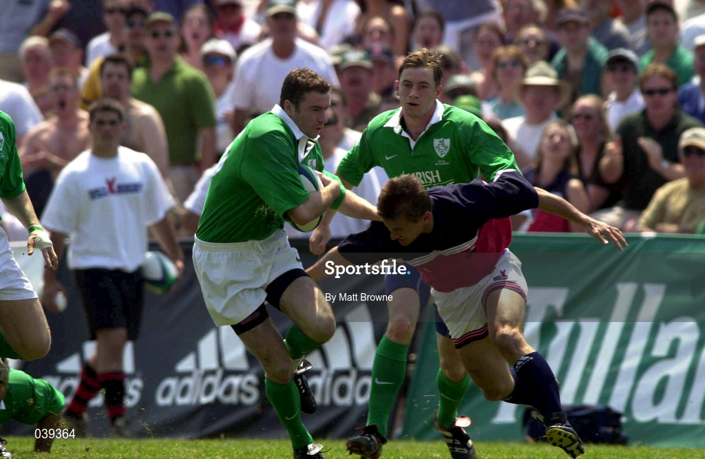 10 June 2000; Geordan Murphy of Ireland is tackled by Andre Blom of USA during the Rugby International match between USA and Ireland at Singer Family Park in Manchester, New Hampshire, USA. Photo by Matt Browne/Sportsfile