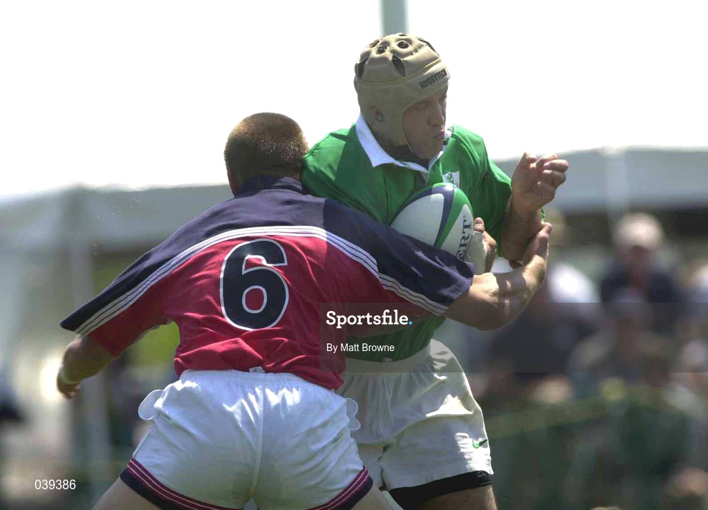 10 June 2000; Mike Mullins of Ireland is tackled by Don Younger of USA during the Rugby International match between USA and Ireland at Singer Family Park in Manchester, New Hampshire, USA. Photo by Matt Browne/Sportsfile