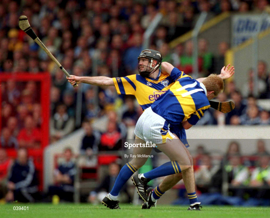11 June 2000; Declan Ryan of Tipperary in action against Sean McMahon of Clare during the Guinness Munster Senior Hurling Championship Semi-Final match between Tipperary and Clare at Páirc Uí Chaoimh in Cork. Photo by Ray McManus/Sportsfile