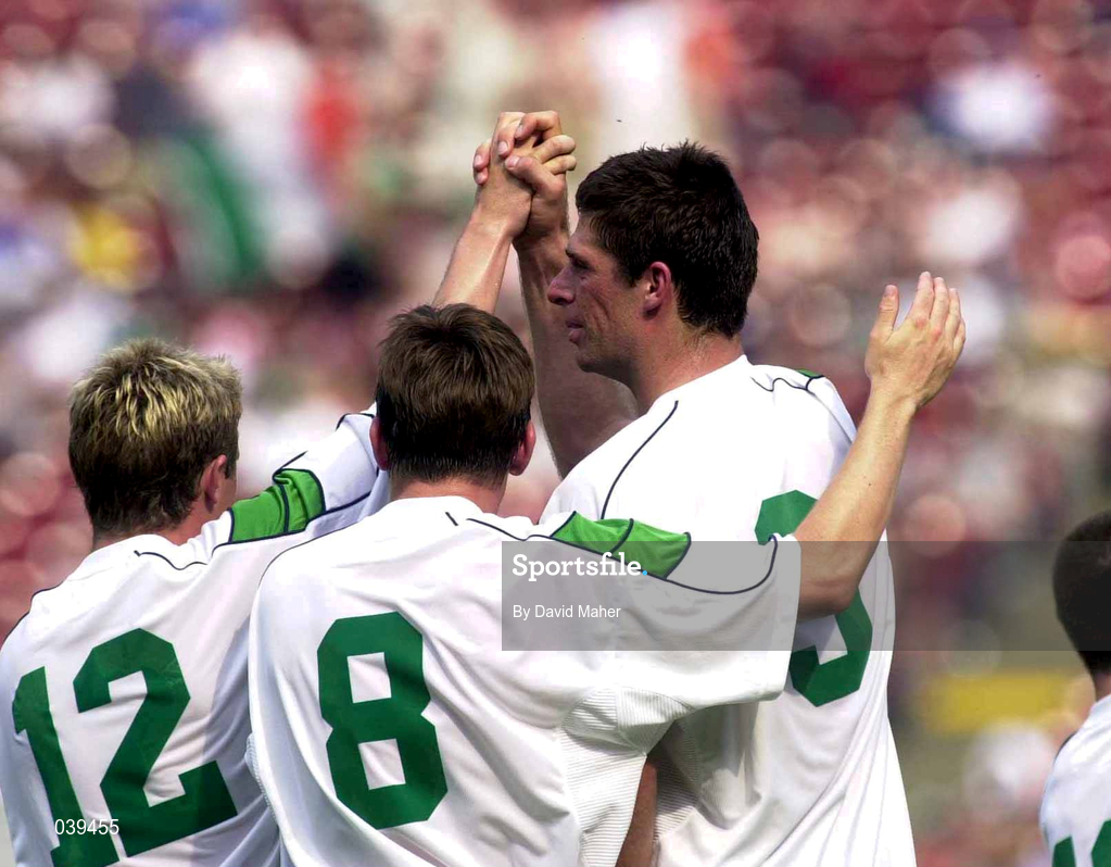 11 June 2000; Niall Quinn, right, celebrates with team-mates Stephen McPhail, 12, and Matt Holland, 8, after scoring his side's second goal during the US Nike Cup match between Republic of Ireland and South Africa at Giants Stadium in East Rutherford, New Jersey, USA. Photo by David Maher/Sportsfile