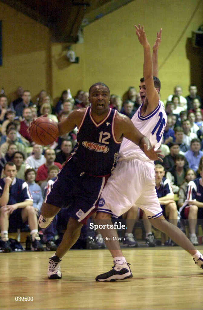 30 January 2000; Denny Notre Dame's Anthony Jenkins in action against Brian Tonkovich of St Vincent's during the Sprite Cup Men's Final match between Denny Notre Dame and St Vincent's at the National Basketball Arena in Tallaght, Dublin. Photo by Brendan Moran/Sportsfile