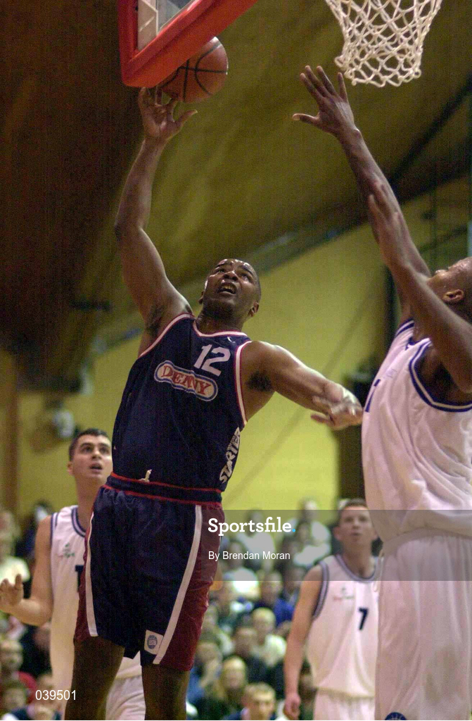 30 January 2000; Denny Notre Dame's Anthony Jenkins in action against Ferdinand Williams of St Vincent's during the Sprite Cup Men's Final match between Denny Notre Dame and St Vincent's at the National Basketball Arena in Tallaght, Dublin. Photo by Brendan Moran/Sportsfile