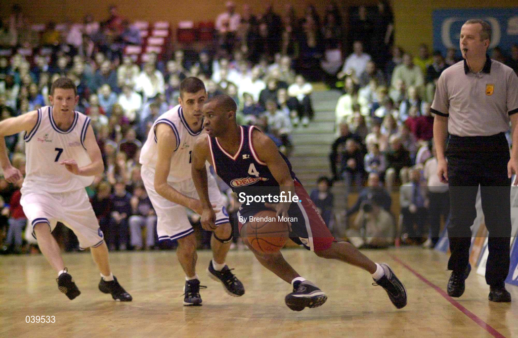 30 January 2000; Denny Notre Dame's Brian Benjamin in action against Stephen McGurk, centre, and Gerry Noone of St Vincent's during the Sprite Cup Men's Final match between Denny Notre Dame and St Vincent's at the National Basketball Arena in Tallaght, Dublin. Photo by Brendan Moran/Sportsfile