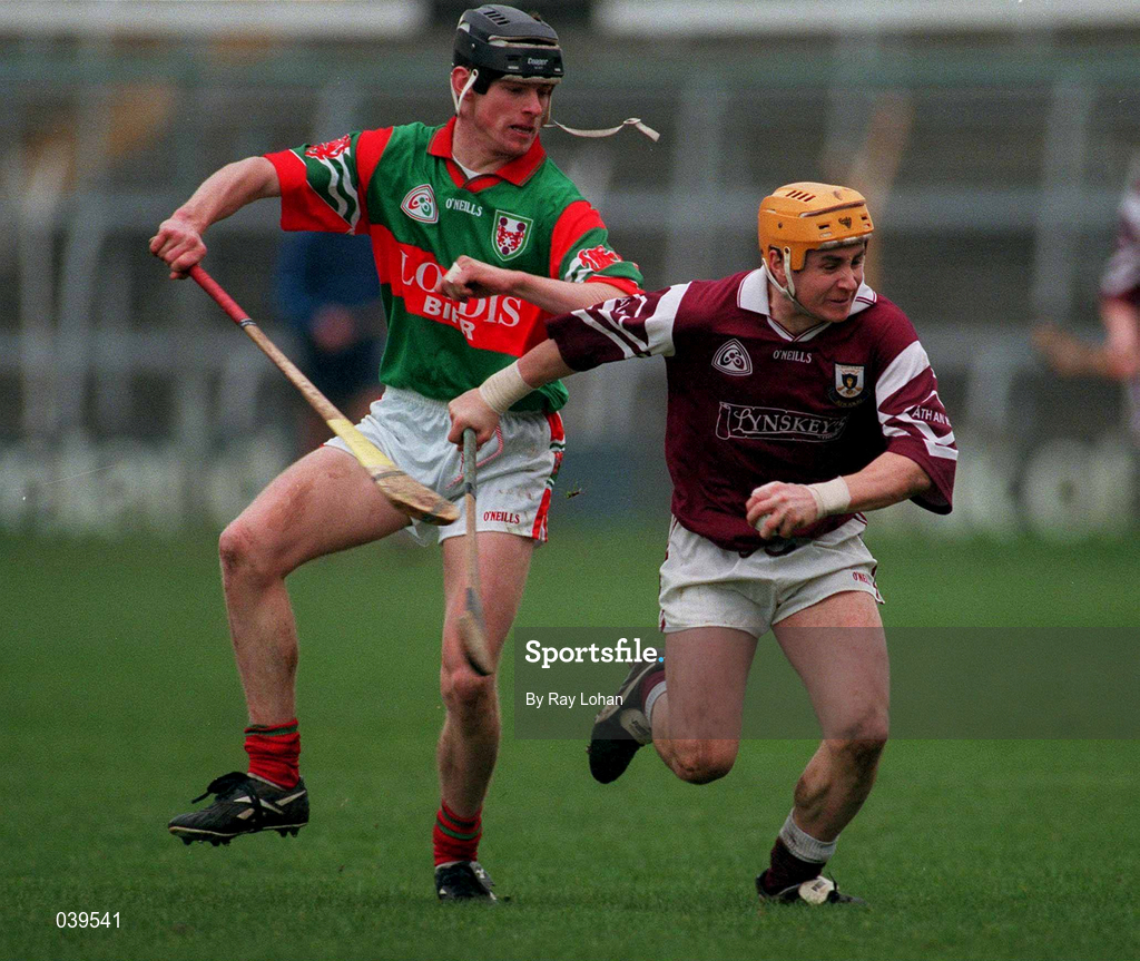 13 February 2000; Brian Higgins of Athenry in action against Paul Molloy of Birr during the AIB All-Ireland Senior Club Hurling Championship Semi-Final match between Birr, Offaly, and St Mary's Athenry, Galway, at Semple Stadium in Thurles, Tipperary. Photo by Ray Lohan/Sportsfile