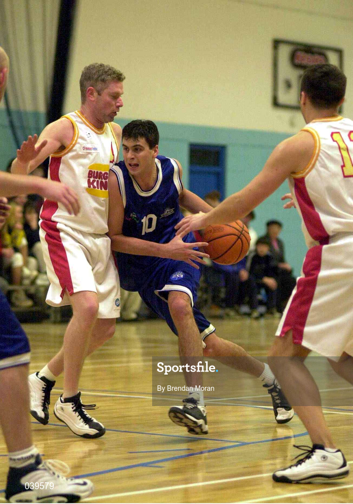 4 December 1999; Brian Tonkovich of St Vincent's in action against Trevor Moore of BK Limerick during the ESB Men's Superleague Basketball match between St Vincent's and BK Limerick at St Vincent's Basketball Club in Glasnevin, Dublin. Photo by Brendan Moran/Sportsfile