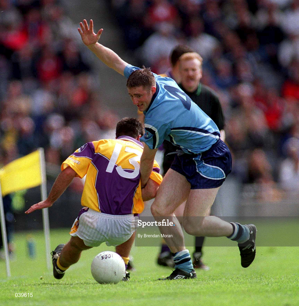 11 June 2000; Coman Goggins of Dublin in action against Scott Doran of Wexford during the Bank of Ireland Leinster Senior Football Championship Quarter-Final match between Dublin and Wexford at Croke Park in Dublin. Photo by Brendan Moran/Sportsfile