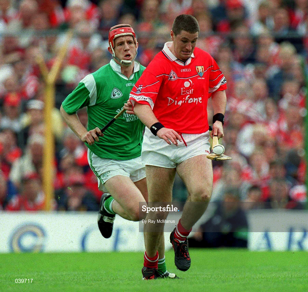 4 June 2000; Fergal McCormack of Cork in action against Ollie Moran of Limerick during the Guinness Munster Senior Hurling Championship Semi-Final match between Cork and Limerick at Semple Stadium in Thurles, Tipperary. Photo by Ray McManus/Sportsfile