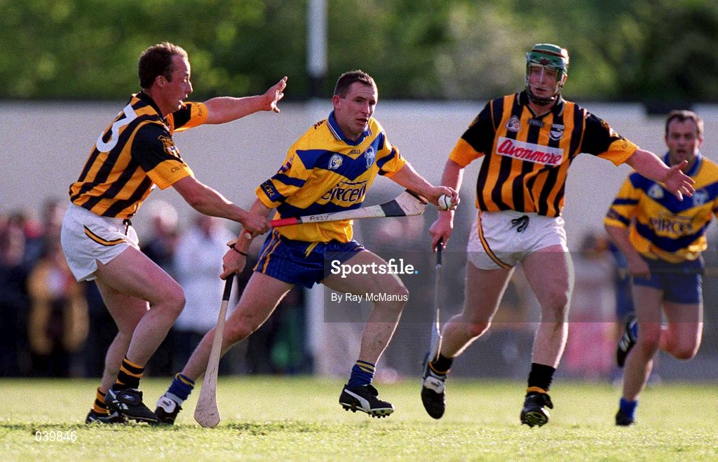 28 February 2000; Colin Lynch of Clare in action against Andy Comerford of Kilkenny during the Senior Hurling Challenge match between Kilkenny and Clare at Young Ireland's GAA Ground in Gowran, Kilkenny. Photo by Ray McManus/Sportsfile
