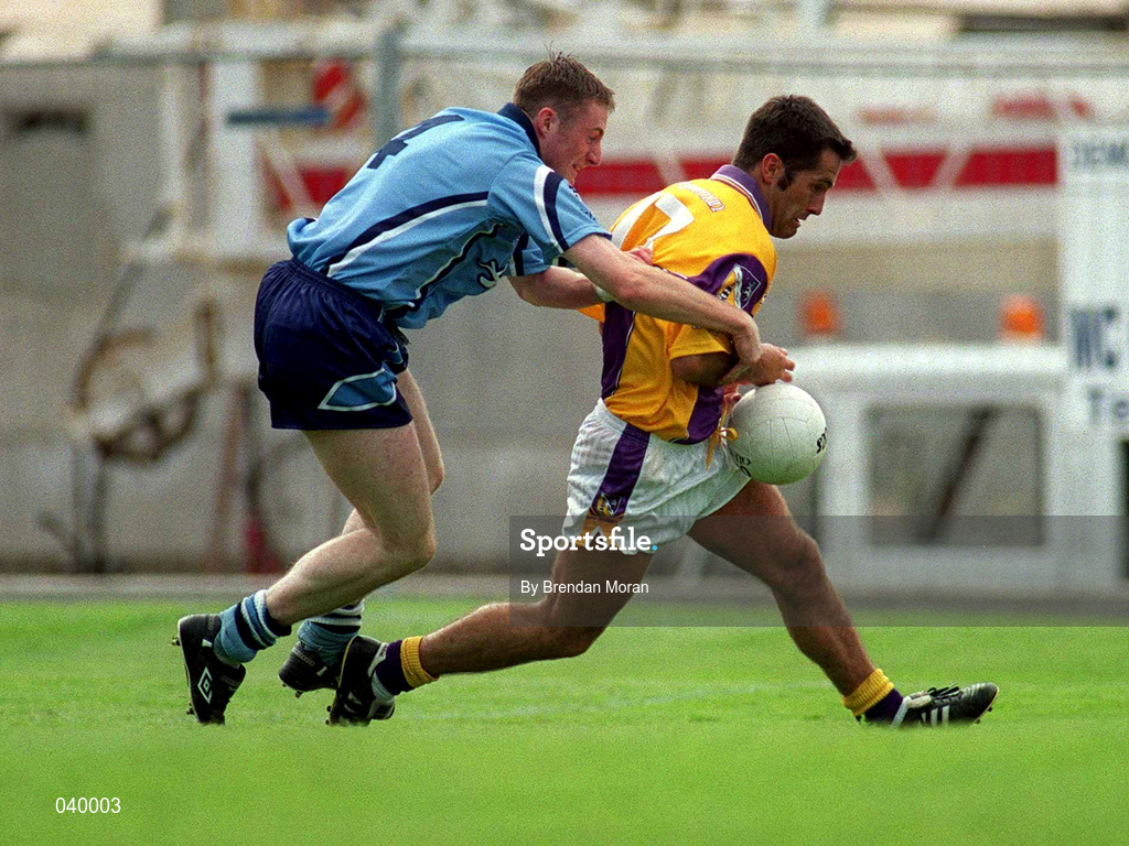 11 June 2000; Scott Doran of Wexford in action against Coman Goggins of Dublin during the Bank of Ireland Leinster Senior Football Championship Quarter-Final match between Dublin and Wexford at Croke Park in Dublin. Photo by Brendan Moran/Sportsfile