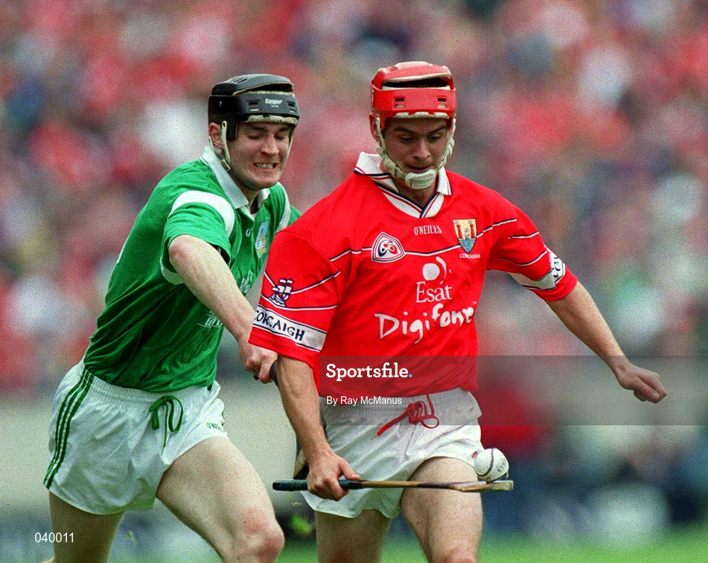 4 June 2000; Sean McGrath of Cork in action against Stephen Lucey of Limerick during the Guinness Munster Senior Hurling Championship Semi-Final match between Cork and Limerick at Semple Stadium in Thurles, Tipperary. Photo by Ray McManus/Sportsfile