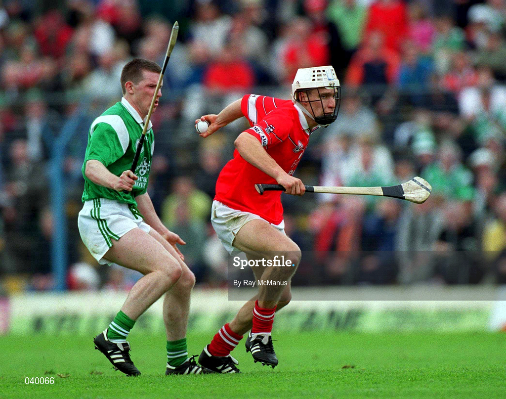 4 June 2000; Timmy McCarthy of Cork in action against Mark Foley of Limerick during the Guinness Munster Senior Hurling Championship Semi-Final match between Cork and Limerick at Semple Stadium in Thurles, Tipperary. Photo by Ray McManus/Sportsfile