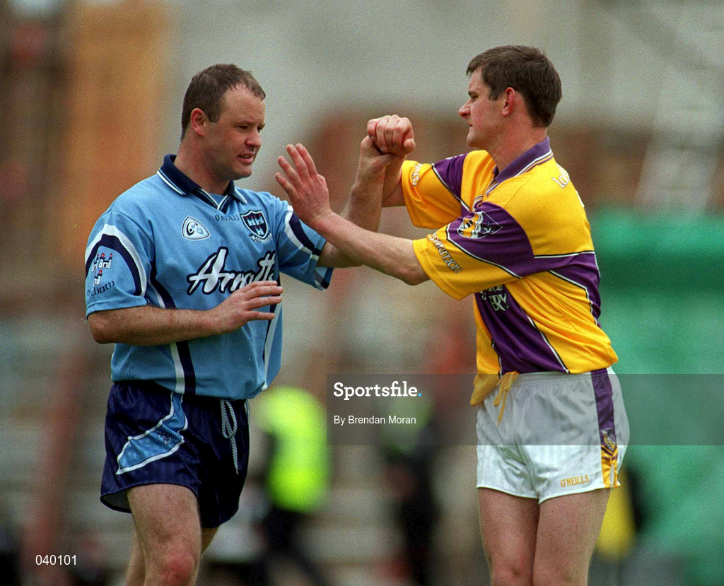 11 June 2000; Vinny Murphy of Dublin tussles with Sean O'Shaughnessy of Wexford during the Bank of Ireland Leinster Senior Football Championship Quarter-Final match between Dublin and Wexford at Croke Park in Dublin. Photo by Brendan Moran/Sportsfile