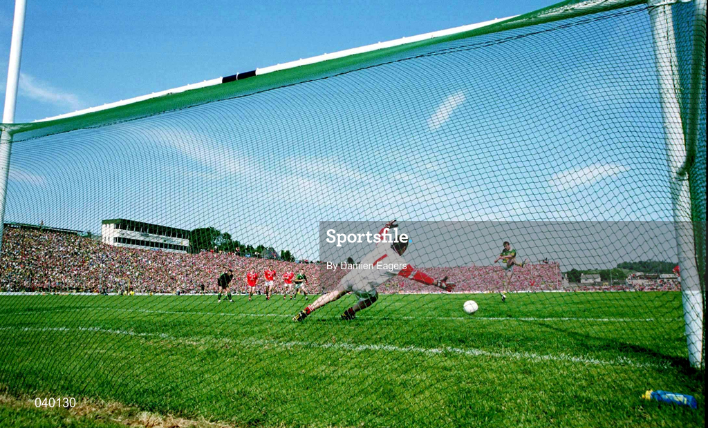 18 June 2000; Kerry's Dara Ó Cinnéide scores his side's first goal, from a penalty, past Cork goalkeeper Kevin O'Dwyer during the Bank of Ireland Munster Senior Football Championship Semi-Final match between Kerry and Cork at Fitzgerald Stadium in Killarney, Kerry. Photo by Damien Eagers/Sportsfile