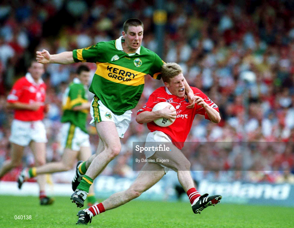 18 June 2000; Anthony Lynch of Cork in action against Darragh Ó Sé of Kerry during the Bank of Ireland Munster Senior Football Championship Semi-Final match between Kerry and Cork at Fitzgerald Stadium in Killarney, Kerry. Photo by Damien Eagers/Sportsfile