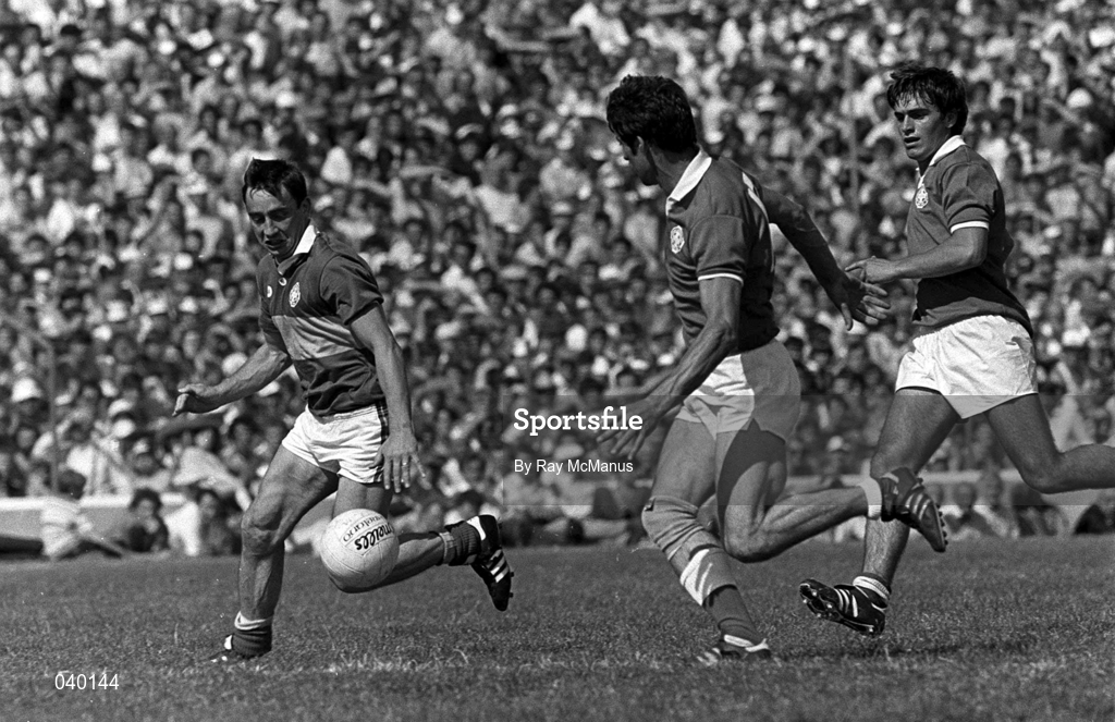 19 July 1984; Denis 'Oige' Moran of Kerry in action against Kevin Kehily and Tony Nation, right, of Cork during the Munster Senior Football Championship Final between Kerry and Cork at Fitzgerald Stadium in Killarney, Kerry. Photo by Ray McManus/Sportsfile