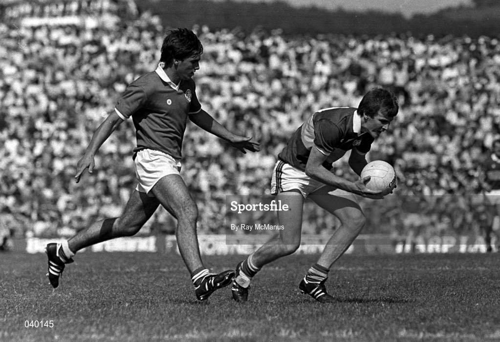 19 July 1984; John Kennedy of Kerry in action against Tony Nation of Cork during the Munster Senior Football Championship Final match between Kerry and Cork at Fitzgerald Stadium in Killarney, Kerry. Photo by Ray McManus/Sportsfile