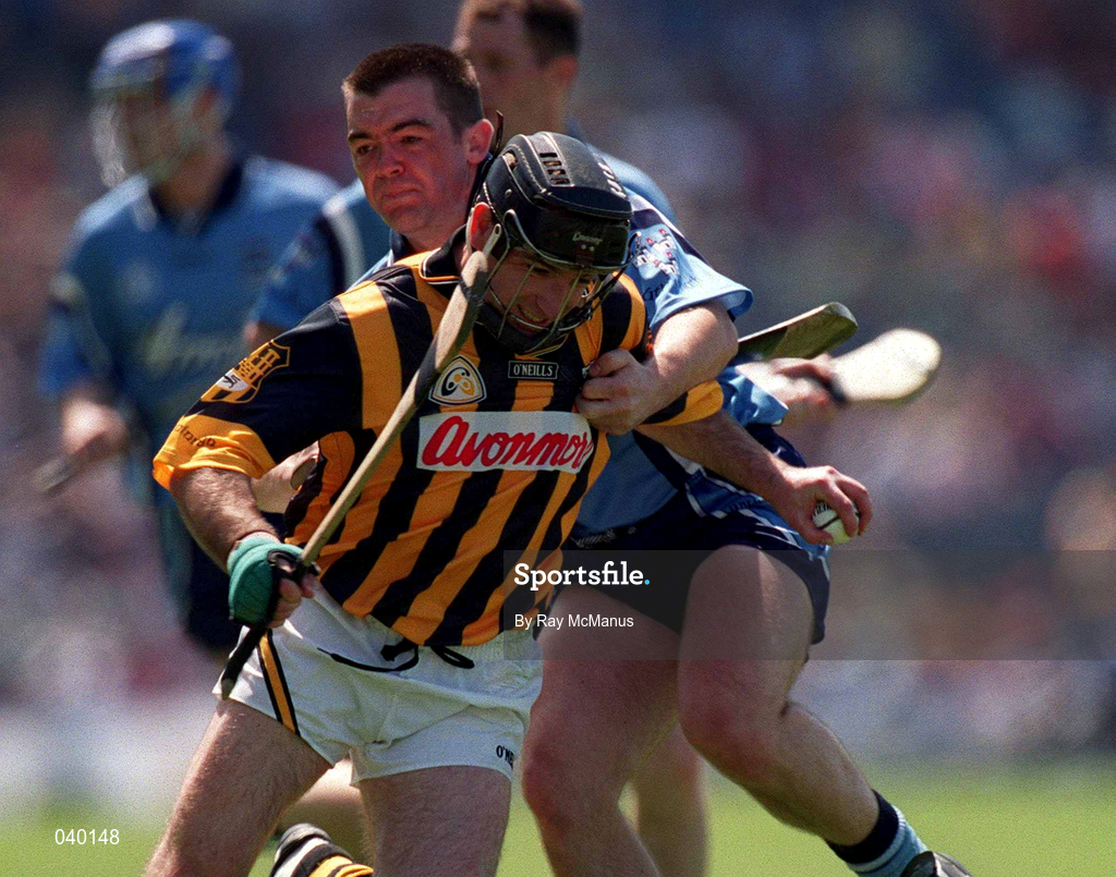 18 June 2000; DJ Carey of Kilkenny is tackled by Sean Power of Dublin during the Guinness Leinster Senior Hurling Championship Semi-Final match between Kilkenny and Dublin at Croke Park in Dublin. Photo by Ray McManus/Sportsfile