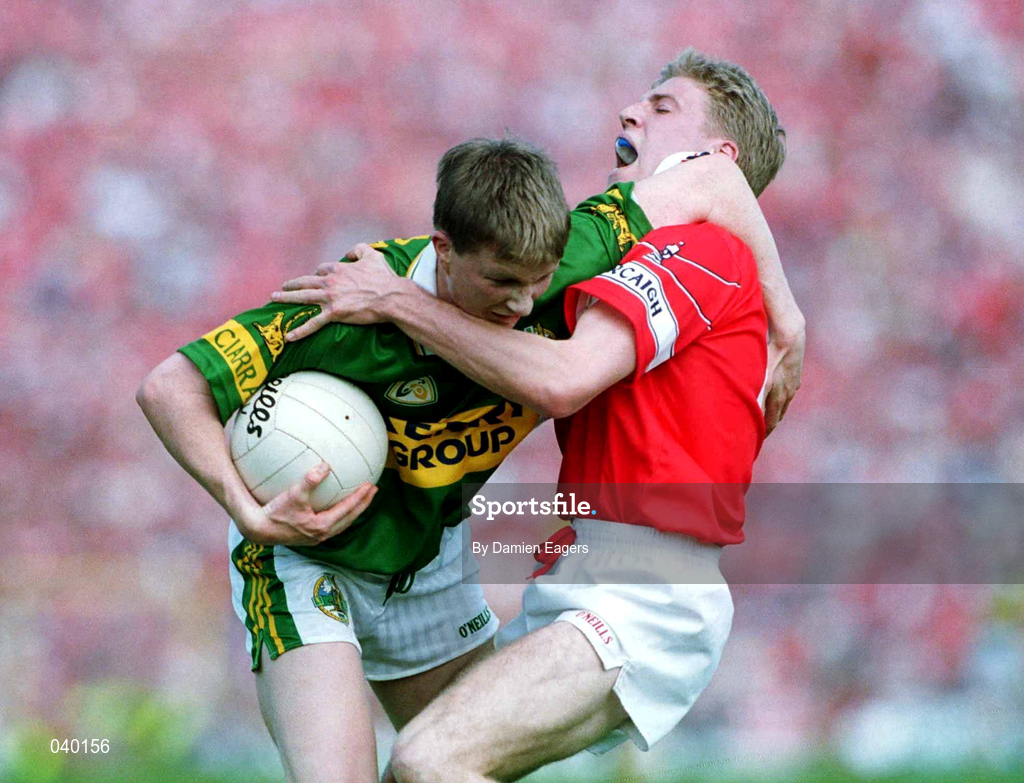 18 June 2000; Mike Frank Russell of Kerry in action against Anthony Lynch of Cork during the Bank of Ireland Munster Senior Football Championship Semi-Final match between Kerry and Cork at Fitzgerald Stadium in Killarney, Kerry. Photo by Damien Eagers/Sportsfile