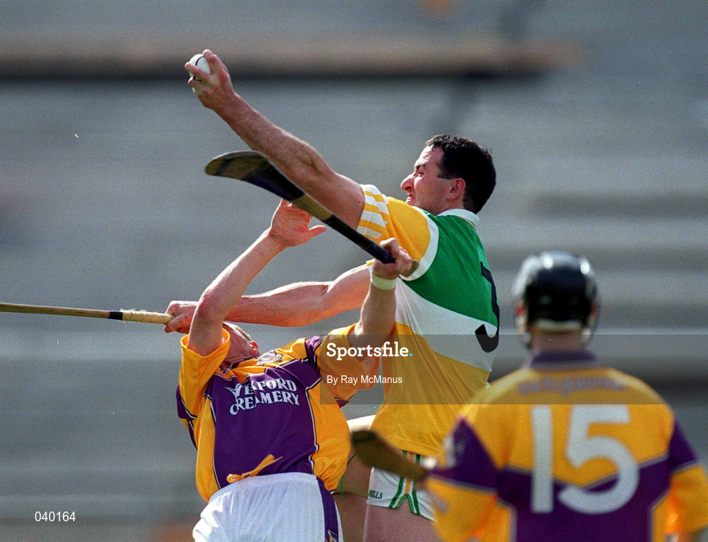 18 June 2000; Kevin Kinahan of Offaly in action against Larry Murphy of Wexford during the Guinness Leinster Senior Hurling Championship Semi-Final match between Offaly and Wexford at Croke Park in Dublin. Photo by Ray McManus/Sportsfile