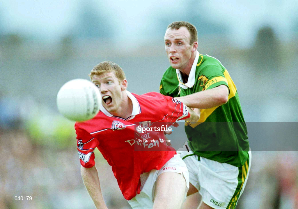 18 June 2000; Donagh Wiseman of Cork in action against John Crowley of Kerry during the Bank of Ireland Munster Senior Football Championship Semi-Final match between Kerry and Cork at Fitzgerald Stadium in Killarney, Kerry. Photo by Brendan Moran/Sportsfile
