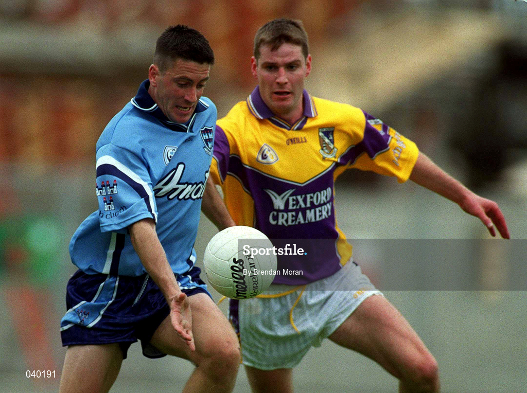 11 June 2000; Senan Connell of Dublin in action against Pat Forde of Wexford during the Bank of Ireland Leinster Senior Football Championship Quarter-Final match between Dublin and Wexford at Croke Park in Dublin. Photo by Brendan Moran/Sportsfile