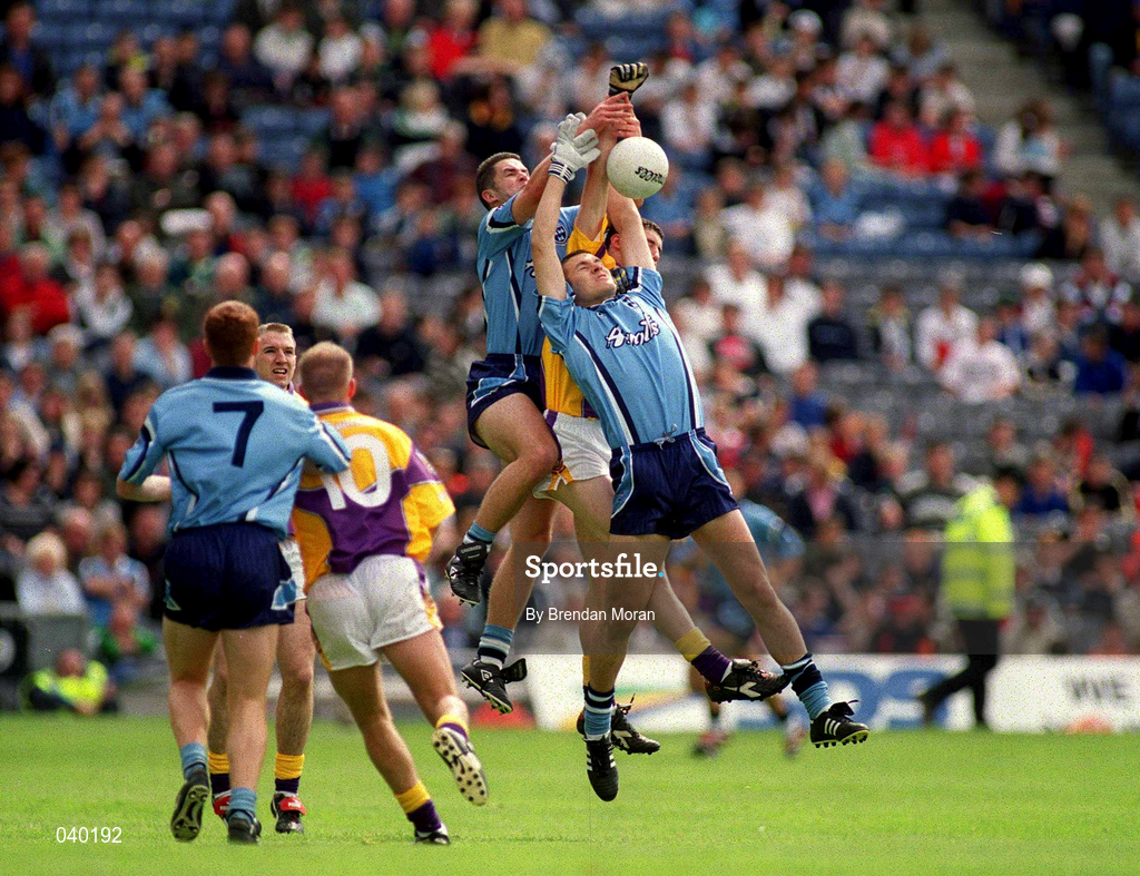 11 June 2000; Enda Sheehy and Ciaran Whelan, right, of Dublin in action against Tom Howlin of Wexford during the Bank of Ireland Leinster Senior Football Championship Quarter-Final match between Dublin and Wexford at Croke Park in Dublin. Photo by Brendan Moran/Sportsfile