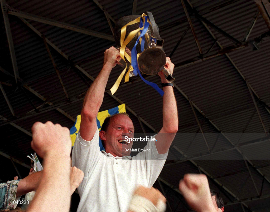 9 July 1995; Clare manager Ger Loughnane celebrates with the cup following the Guinness Munster Senior Hurling Championship Final between Clare and Limerick at Semple Stadium in Thurles, Tipperary. Photo by Matt Browne/Sportsfile