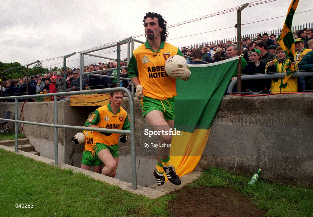 11 June 2000; Donegal captain Jim McGuinness leads his team onto the pitch prior to the Bank of Ireland Ulster Senior Football Championship Quarter-Final match between Donegal and Fermanagh at MacCumhail Park in Ballybofey, Donegal. Photo by Ray Lohan/Sportsfile