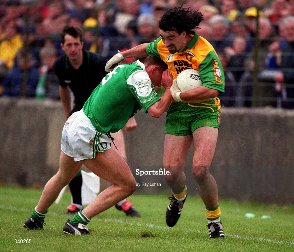 11 June 2000; Jim McGuinness of Donegal in action against Paul Brewster of Fermanagh during the Bank of Ireland Ulster Senior Football Championship Quarter-Final match between Donegal and Fermanagh at MacCumhail Park in Ballybofey, Donegal. Photo by Ray Lohan/Sportsfile