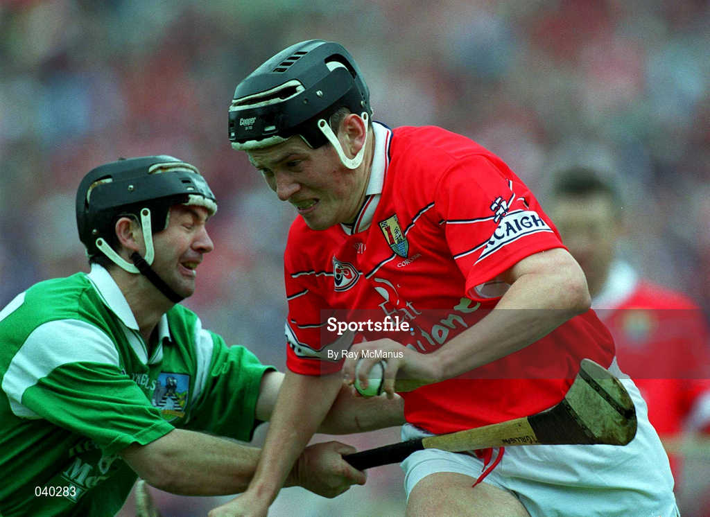 4 June 2000; John Browne of Cork in action against Mike Galligan of Limerick during the Guinness Munster Senior Hurling Championship Semi-Final match between Cork and Limerick at Semple Stadium in Thurles, Tipperary. Photo by Ray McManus/Sportsfile