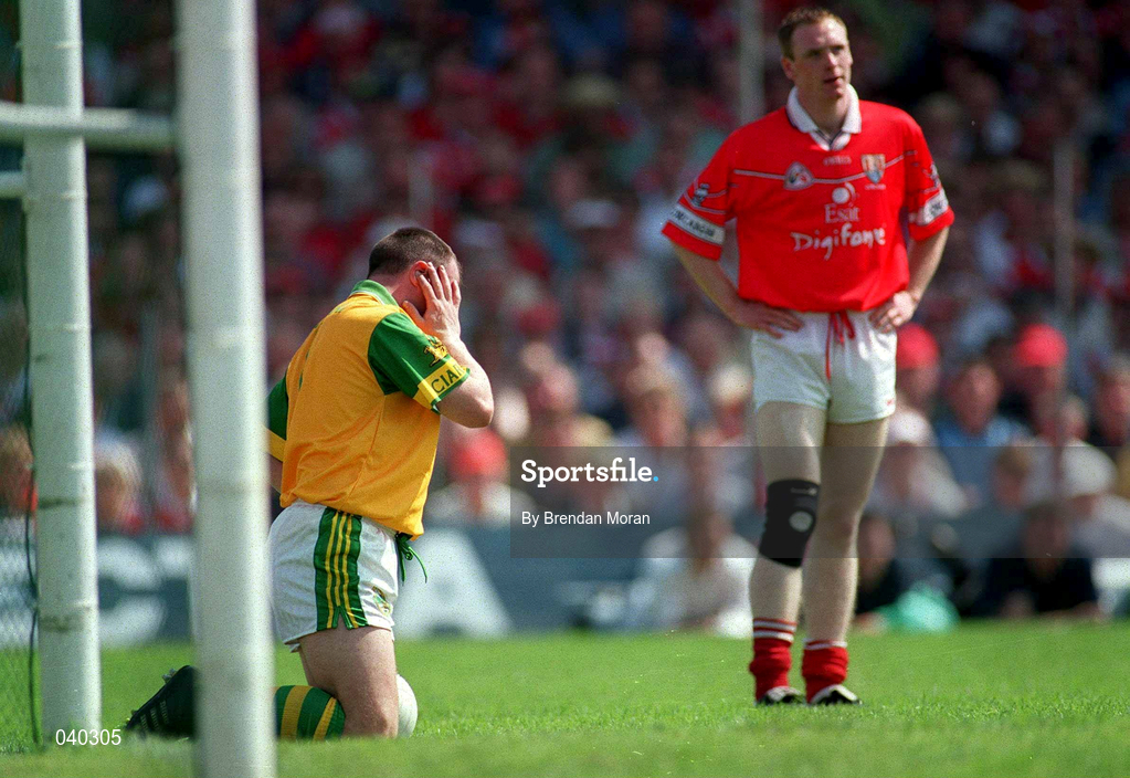 18 June 2000; Kerry goalkeeper Declan O'Keeffe reacts after a challenge by Cork's Philip Clifford, right, which resulted in the Cork player being given a yellow card by referee Mick Curley during the Bank of Ireland Munster Senior Football Championship Semi-Final match between Kerry and Cork at Fitzgerald Stadium in Killarney, Kerry. Photo by Brendan Moran/Sportsfile