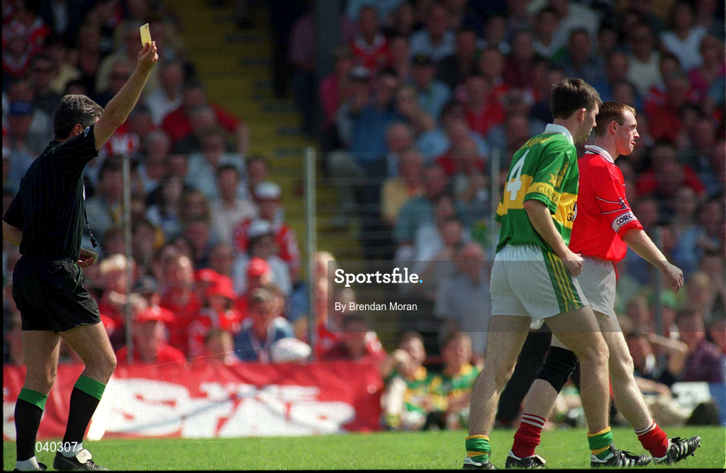 18 June 2000; Cork's Philip Clifford is shown a yellow card by referee Mick Curley during the Bank of Ireland Munster Senior Football Championship Semi-Final match between Kerry and Cork at Fitzgerald Stadium in Killarney, Kerry. Photo by Brendan Moran/Sportsfile