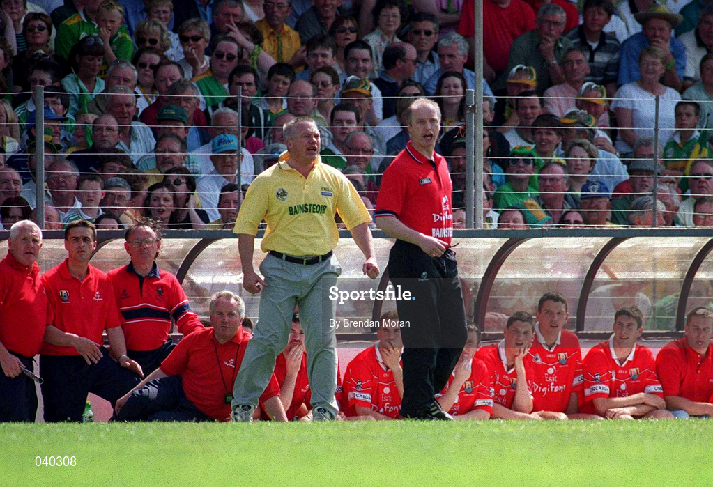 18 June 2000;  Cork manager Larry Tompkins, right, and Kerry manager Páidí Ó Sé during the Bank of Ireland Munster Senior Football Championship Semi-Final match between Kerry and Cork at Fitzgerald Stadium in Killarney, Kerry. Photo by Brendan Moran/Sportsfile