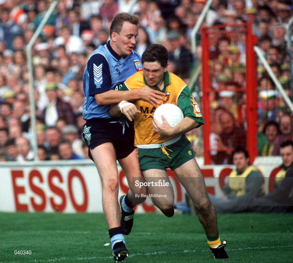 20 September 1992; Martin McHugh of Donegal is tackled by Keith Barr of Dublin during the All-Ireland Senior Football Championship Final between Donegal and Dublin at Croke Park in Dublin. Photo by David Maher/Sportsfile