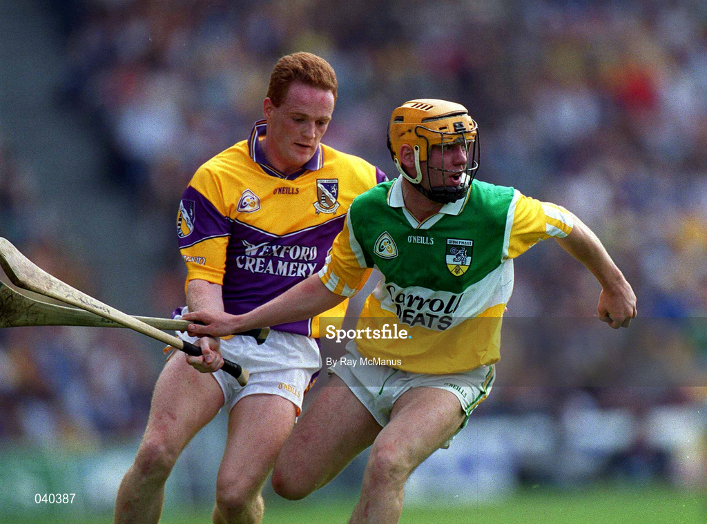18 June 2000; Paudie Mulhare of Offaly in action against Rod Guiney of Wexford during the Guinness Leinster Senior Hurling Championship Semi-Final match between Offaly and Wexford at Croke Park in Dublin. Photo by Ray McManus/Sportsfile