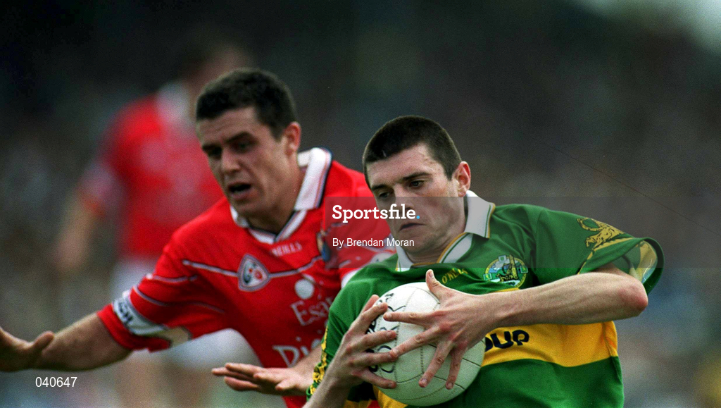 18 June 2000; Aodhan MacGearailt of Kerry in action against Martin Cronin of Cork during the Bank of Ireland Munster Senior Football Championship Semi-Final match between Kerry and Cork at Fitzgerald Stadium in Killarney, Kerry. Photo by Brendan Moran/Sportsfile