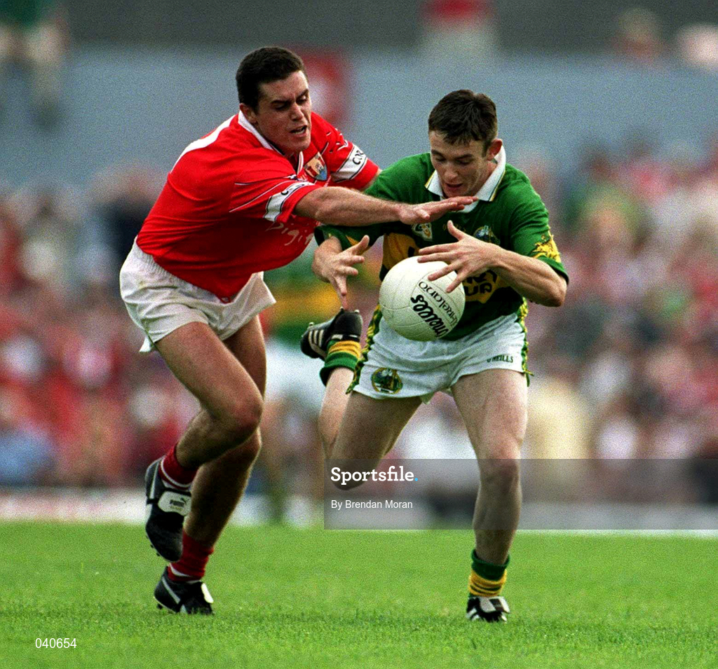 18 June 2000; Enda Galvin of Kerry in action against Martin Cronin of Cork during the Bank of Ireland Munster Senior Football Championship Semi-Final match between Kerry and Cork at Fitzgerald Stadium in Killarney, Kerry. Photo by Brendan Moran/Sportsfile