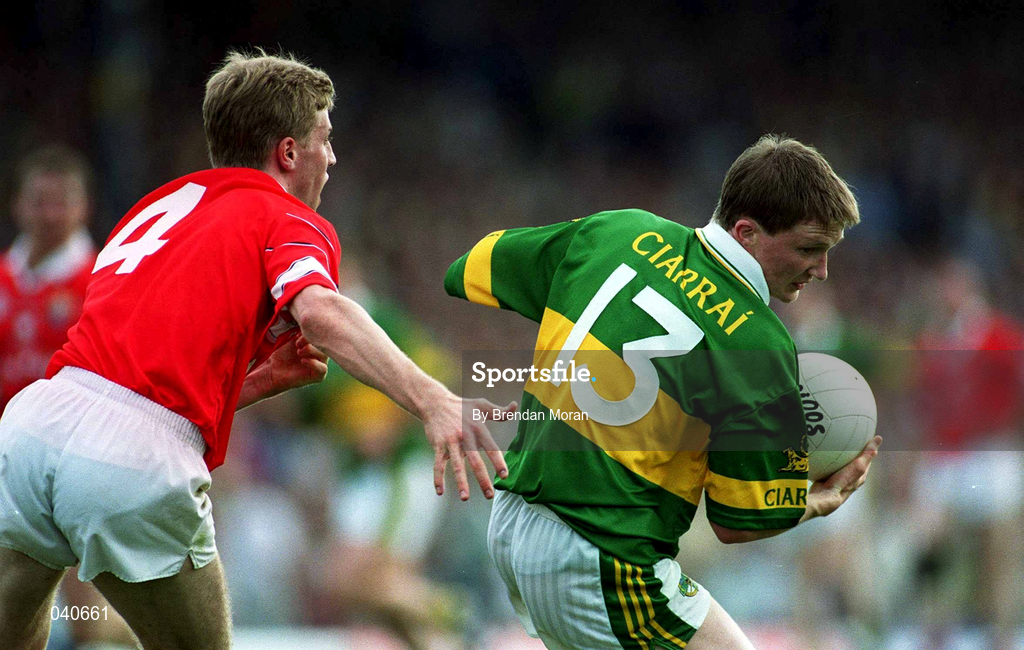 18 June 2000; Mike Frank Russell of Kerry in action against Anthony Lynch of Cork during the Bank of Ireland Munster Senior Football Championship Semi-Final match between Kerry and Cork at Fitzgerald Stadium in Killarney, Kerry. Photo by Brendan Moran/Sportsfile
