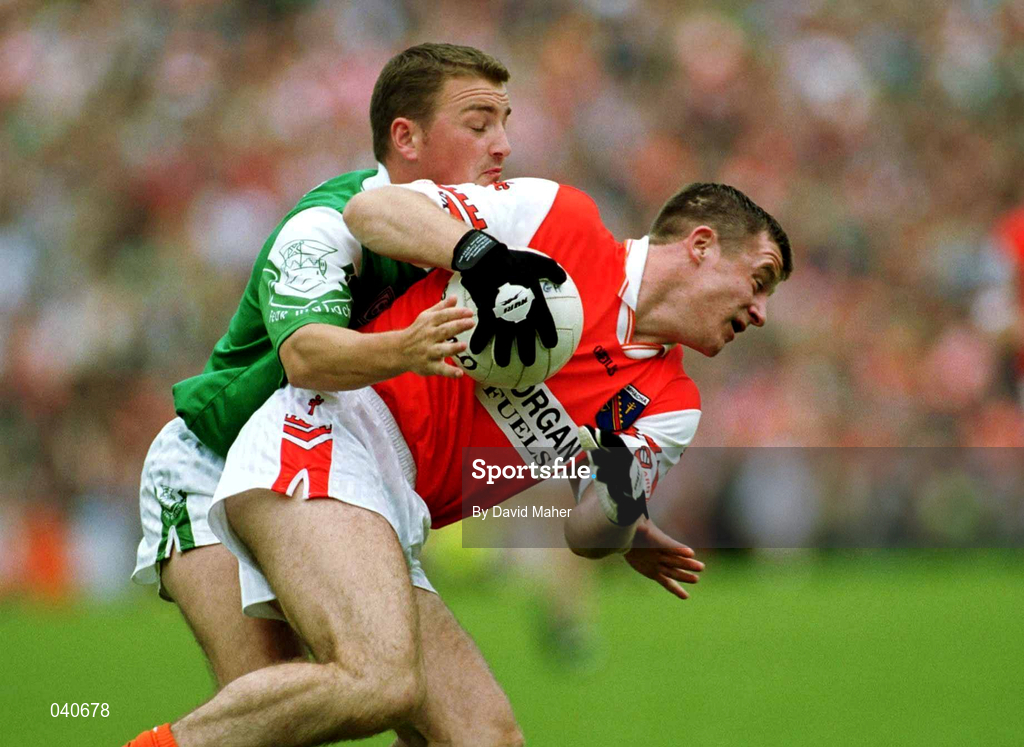 25 June 2000;  Justin McNulty of Armagh in action against Shane King of Fermanagh during the Bank of Ireland Ulster Senior Football Championship Semi-Final match between Armagh and Fermanagh at at St Tiernach's Park in Clones, Monaghan. Photo by David Maher/Sportsfile