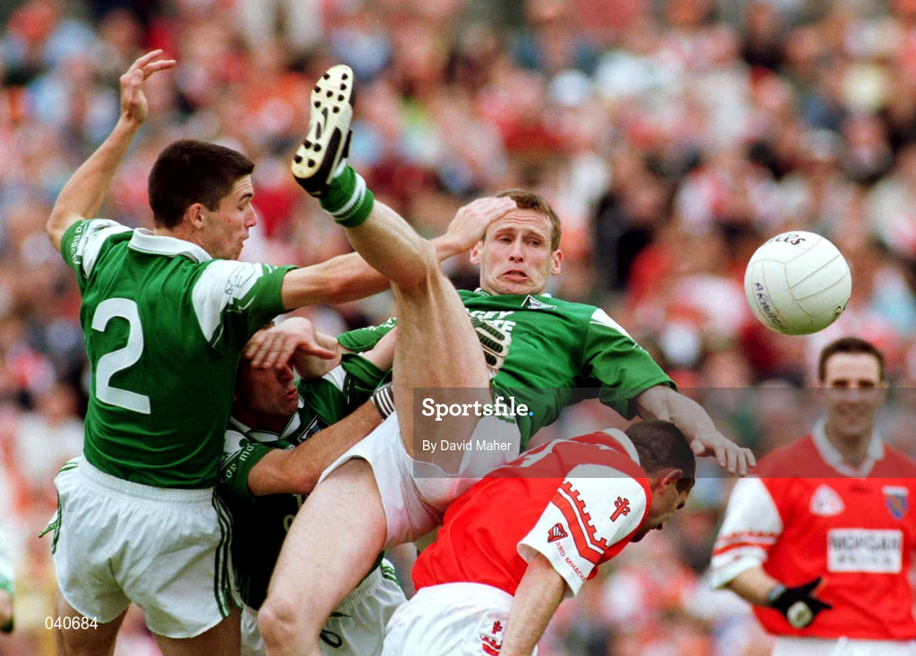 25 June 2000; Fermanagh's Barry Carty, Justin Giheaney and Paddy McGuinness in action against Alan O'Neill of Armagh during the Bank of Ireland Ulster Senior Football Championship Semi-Final match between Armagh and Fermanagh at at St Tiernach's Park in Clones, Monaghan. Photo by David Maher/Sportsfile
