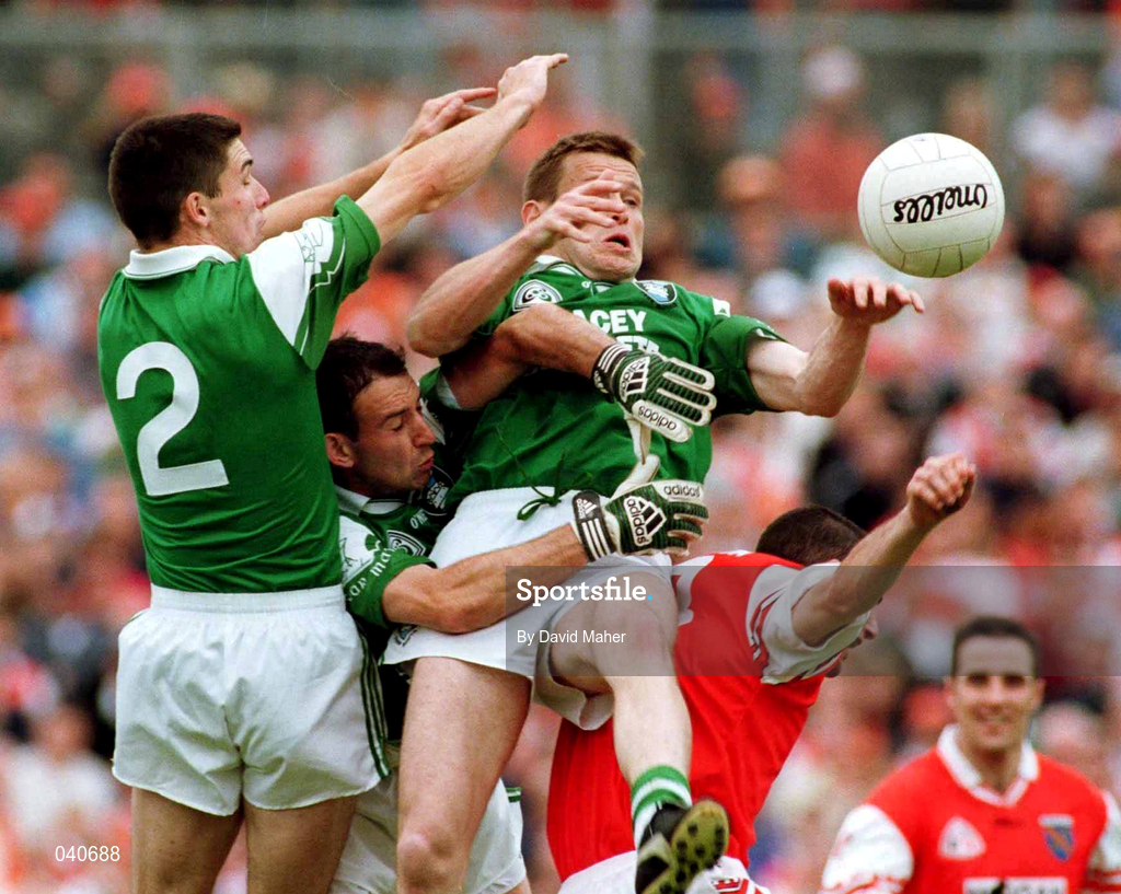 25 June 2000; Fermanagh's Barry Carty, Justin Giheaney and Paddy McGuinness in action against Alan O'Neill of Armagh during the Bank of Ireland Ulster Senior Football Championship Semi-Final match between Armagh and Fermanagh at at St Tiernach's Park in Clones, Monaghan. Photo by David Maher/Sportsfile