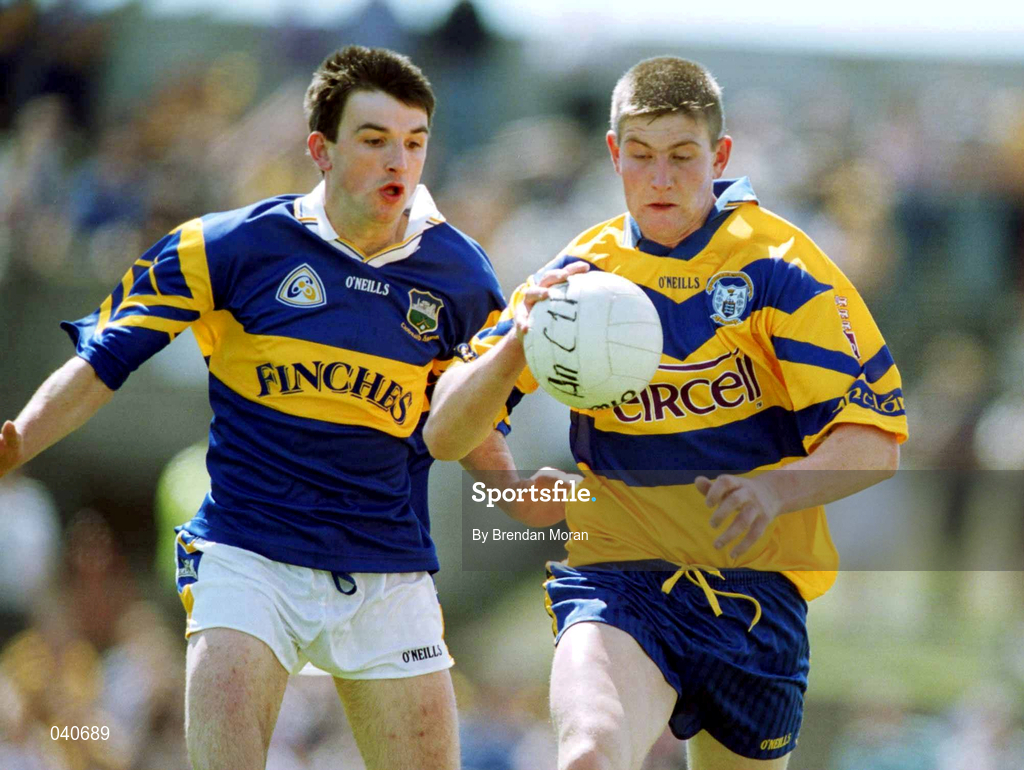 25 June 2000; David Russell of Clare gets away from the challenge of Dan Hackett of Tipperary during the Bank of Ireland Munster Senior Football Championship Semi-Final match between Clare and Tipperary at the Gaelic Grounds in Limerick. Photo by Brendan Moran/Sportsfile
