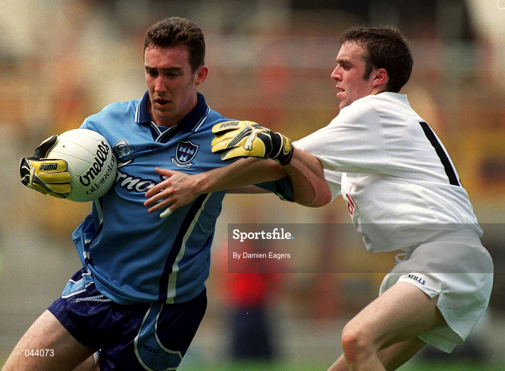 30 July 2000; Paddy Christie of Dublin is tackled by Tadhg Fennin of Kildare during the Bank of Ireland Leinster Senior Football Championship Final between Dublin and Kildare at Croke Park in Dublin. Photo by Damien Eagers/Sportsfile