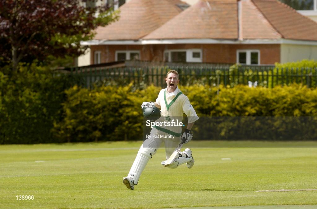 6 May 2004; Ireland batsman Andrew White celebrates after team-mate Kyle McCallan, not pictured, scored the winning run during the Cheltenham & Gloucester Trophy Second Round match between Ireland and Surrey at Clontarf Cricket Club in Castle Avenue, Dublin. Photo by Pat Murphy/Sportsfile