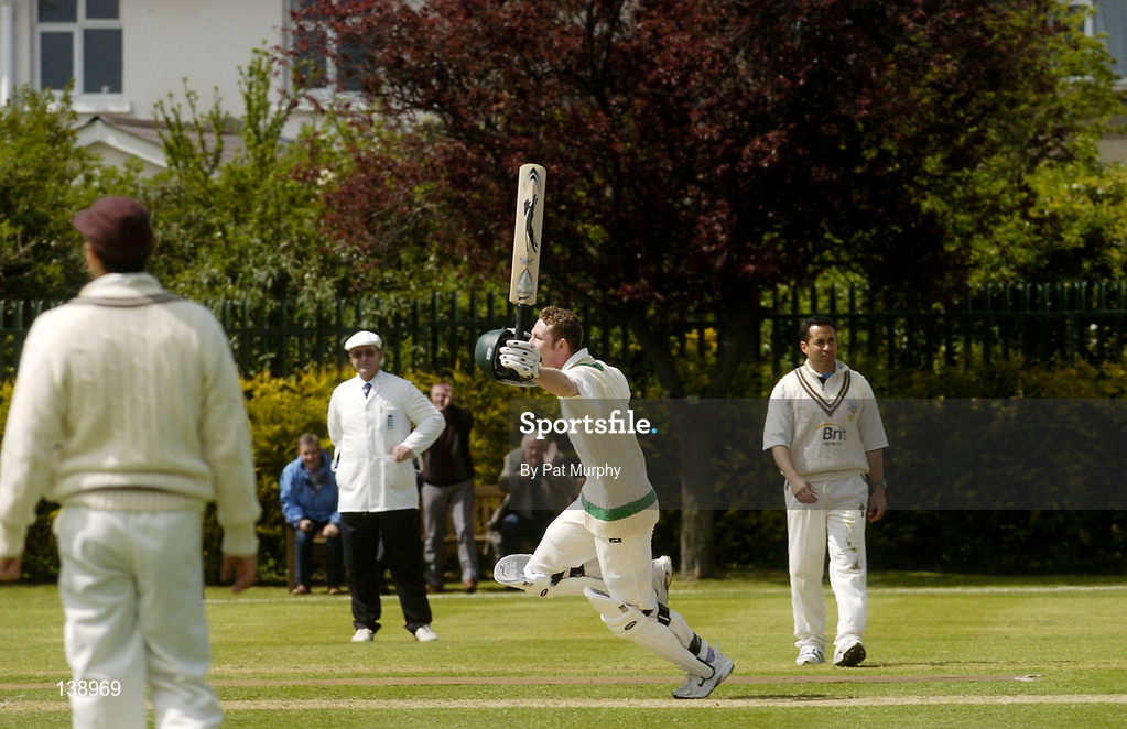 6 May 2004; Ireland batsman Andrew White celebrates after team-mate Kyle McCallan, not pictured, scored the winning run during the Cheltenham & Gloucester Trophy Second Round match between Ireland and Surrey at Clontarf Cricket Club in Castle Avenue, Dublin. Photo by Pat Murphy/Sportsfile