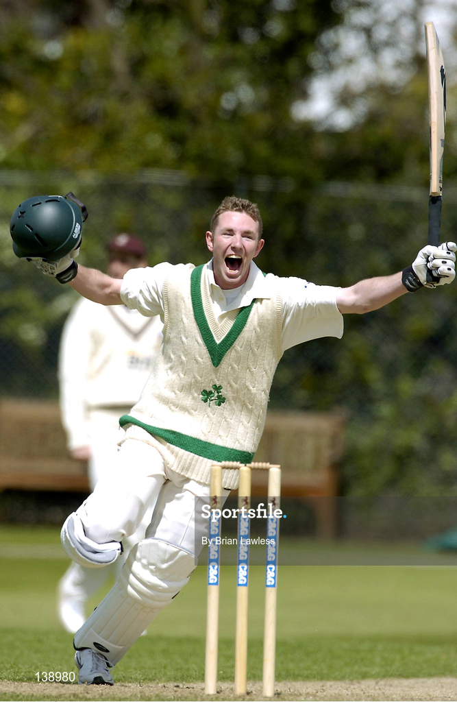 6 May 2004; Ireland batsman Andrew White celebrates after team-mate Kyle McCallan, not pictured, scored their winning run during the Cheltenham & Gloucester Trophy Second Round match between Ireland and Surrey at Clontarf Cricket Club in Castle Avenue, Dublin. Photo by Brian Lawless/Sportsfile