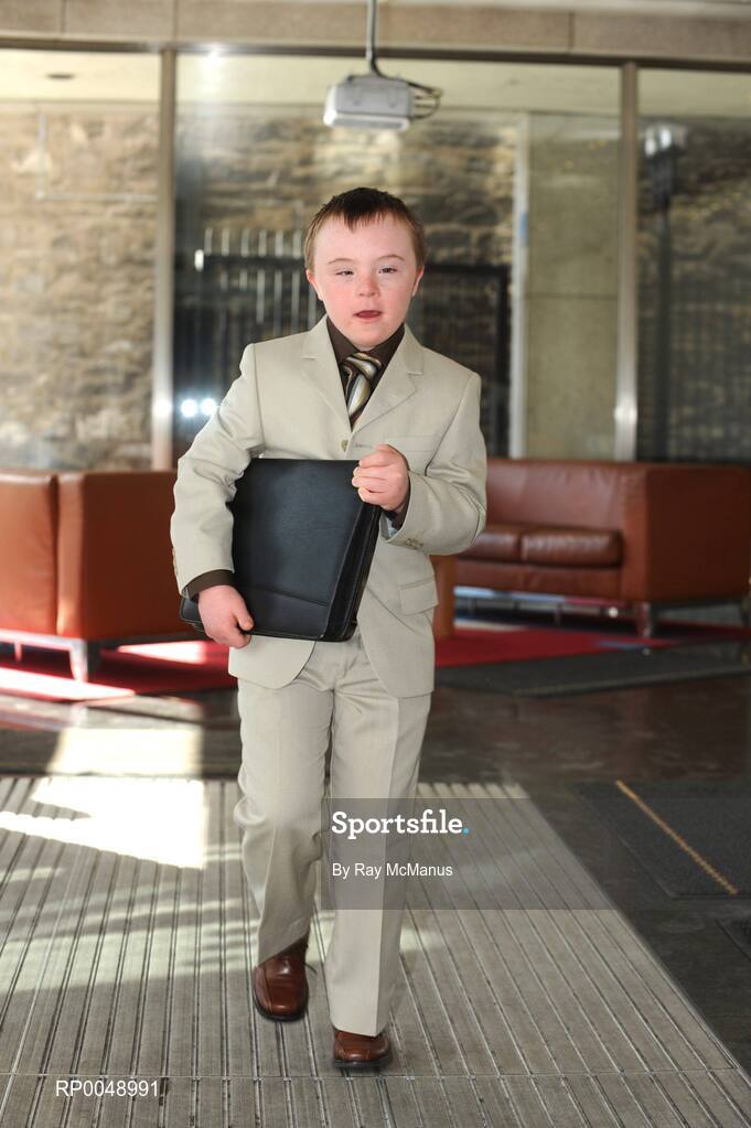 12 March 2008; Ten-year-old Special Olympics athlete Josh Hennessy, from Speisialta Special Olympics Club, Clondalkin, arrives to 'seal the deal' with Cathal Magee, Managing Director, eircom Retail, at the announcement that eircom has renewed its sponsorship of Special Olympics Ireland for another four years. eircom offices, St. Stephen's Green, Dublin. Picture credit: Ray McManus / SPORTSFILE