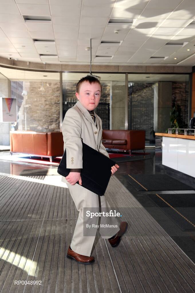 12 March 2008; Ten-year-old Special Olympics athlete Josh Hennessy, from Speisialta Special Olympics Club, Clondalkin, arrives to 'seal the deal' with Cathal Magee, Managing Director, eircom Retail, at the announcement that eircom has renewed its sponsorship of Special Olympics Ireland for another four years. eircom offices, St. Stephen's Green, Dublin. Picture credit: Ray McManus / SPORTSFILE